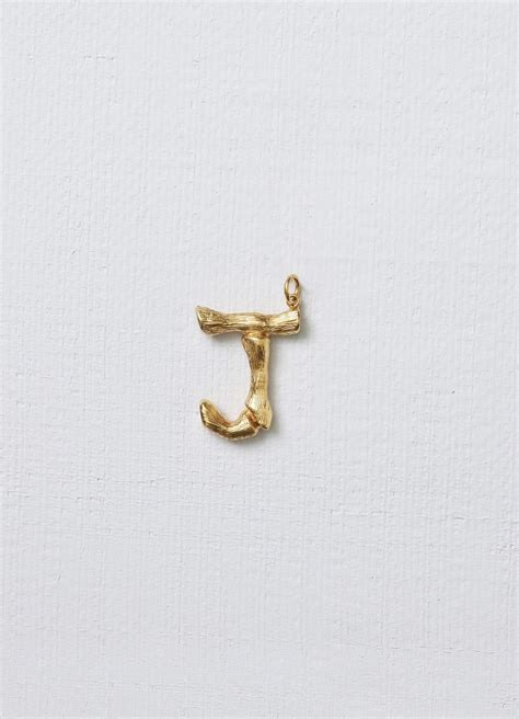 Alphabet J pendant in brass 